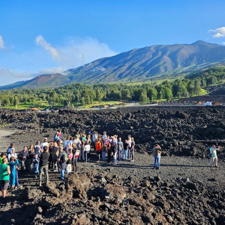 Mount Etna volcano with smoking crater and rugged volcanic landscape in Sicily