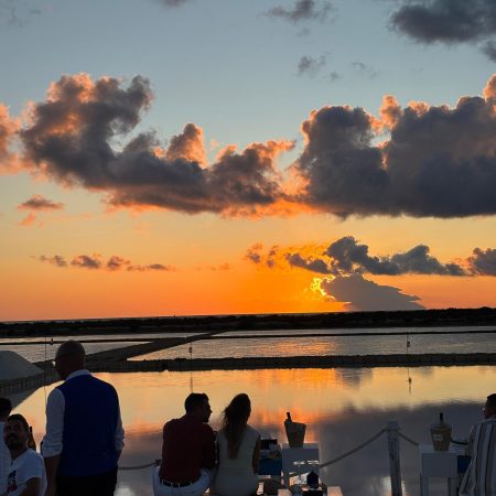 Panoramic view of Marsala with historic landmarks and seaside scenery during a sightseeing tour